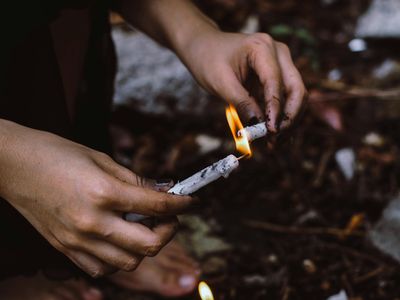 Close-up of hands in a meditative gesture during practice.